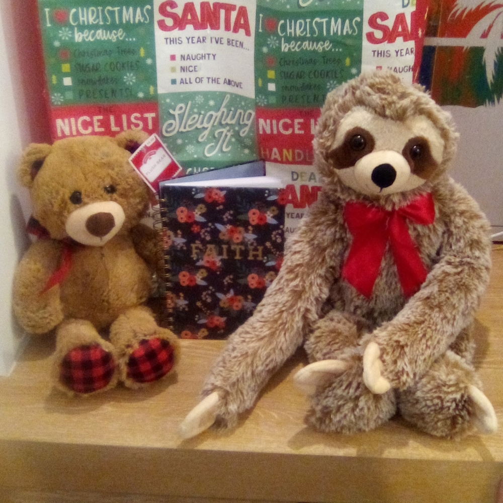Notebook, Two Stuffed animals.